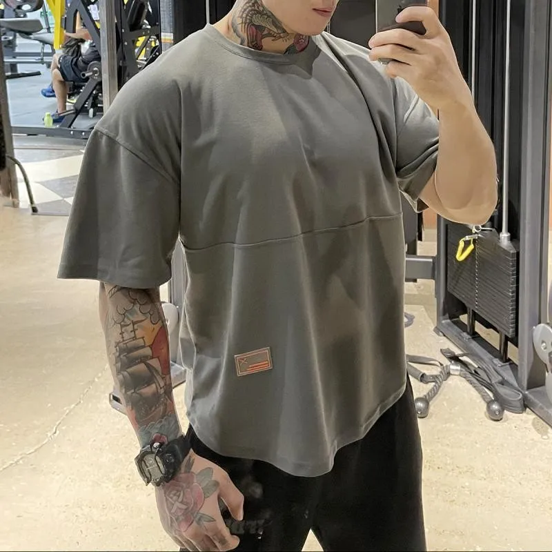 

New Loose Hip Hop Large Size Brand Gyms Sports Pure Color T Shirt Men Short Sleeve Running Workout Training Tees Fitness Tops