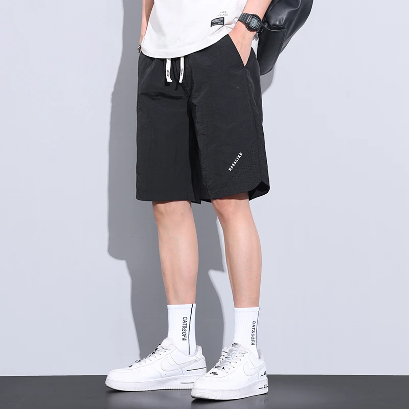 Fashion Elastic Spliced Printing Letter Casual Shorts Men's Clothing 2024 Summer New Loose Solid Color All-match Knee Shorts