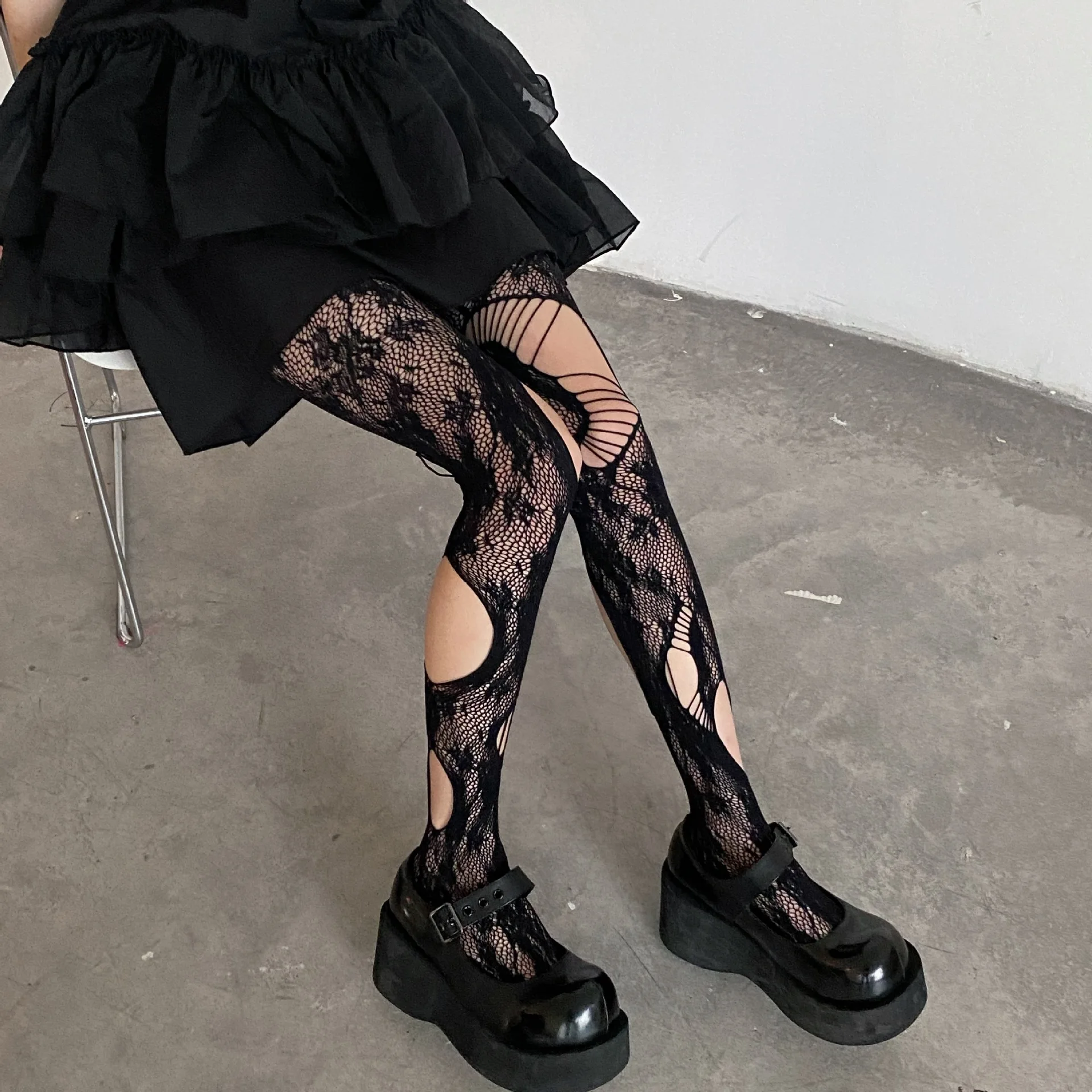 https://ae01.alicdn.com/kf/Se97c3accbd4540358453516729ce552b0/New-Cool-Black-Hollowed-out-Rip-Hole-Fishnet-Stockings-Pantyhose-Dark-Millennium-Rose-Stockings.jpg