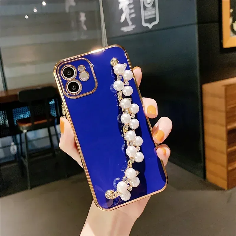 thumbnail image 1 of Funda blanda con cadena y pulsera de perlas chapadas de lujo para iPhone 15, 13, 14, 12 Pro Max, 11, XS, X, XR, 7, 8 Plus, mini SE, funda de silicona con purpurina, 1 of 5