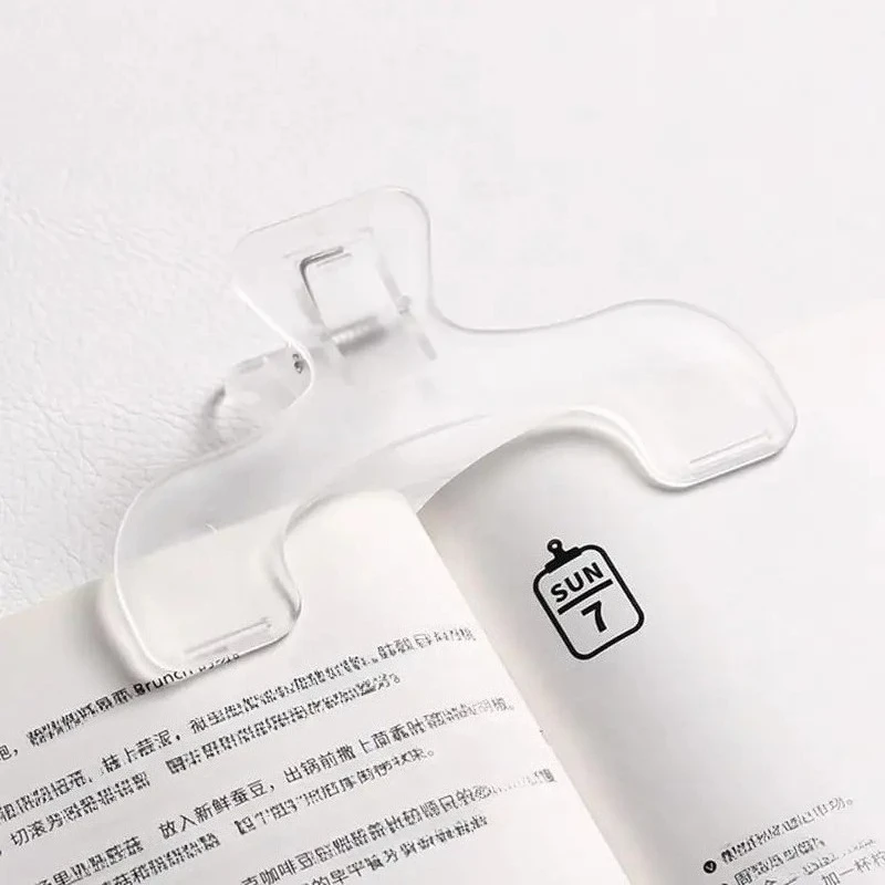 2pcs 투명 플라스틱 책 클립 간단한 독서 보조 고정 책 홀더 창의적인 디자인..