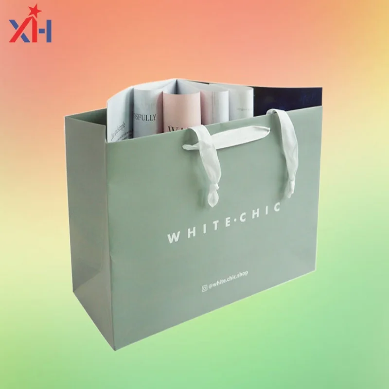 

OEM Customized Design Luxury clothing shop retail Paper Bag Recycling Shopping Paper Bag With Flexiloop Handle