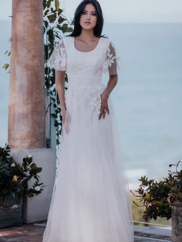 

Romantic A Line Wedding Dress Tulle With O Neck Short Illusion Sleeves Lace Applique Button Back With Sweep Train Bridal Gowns