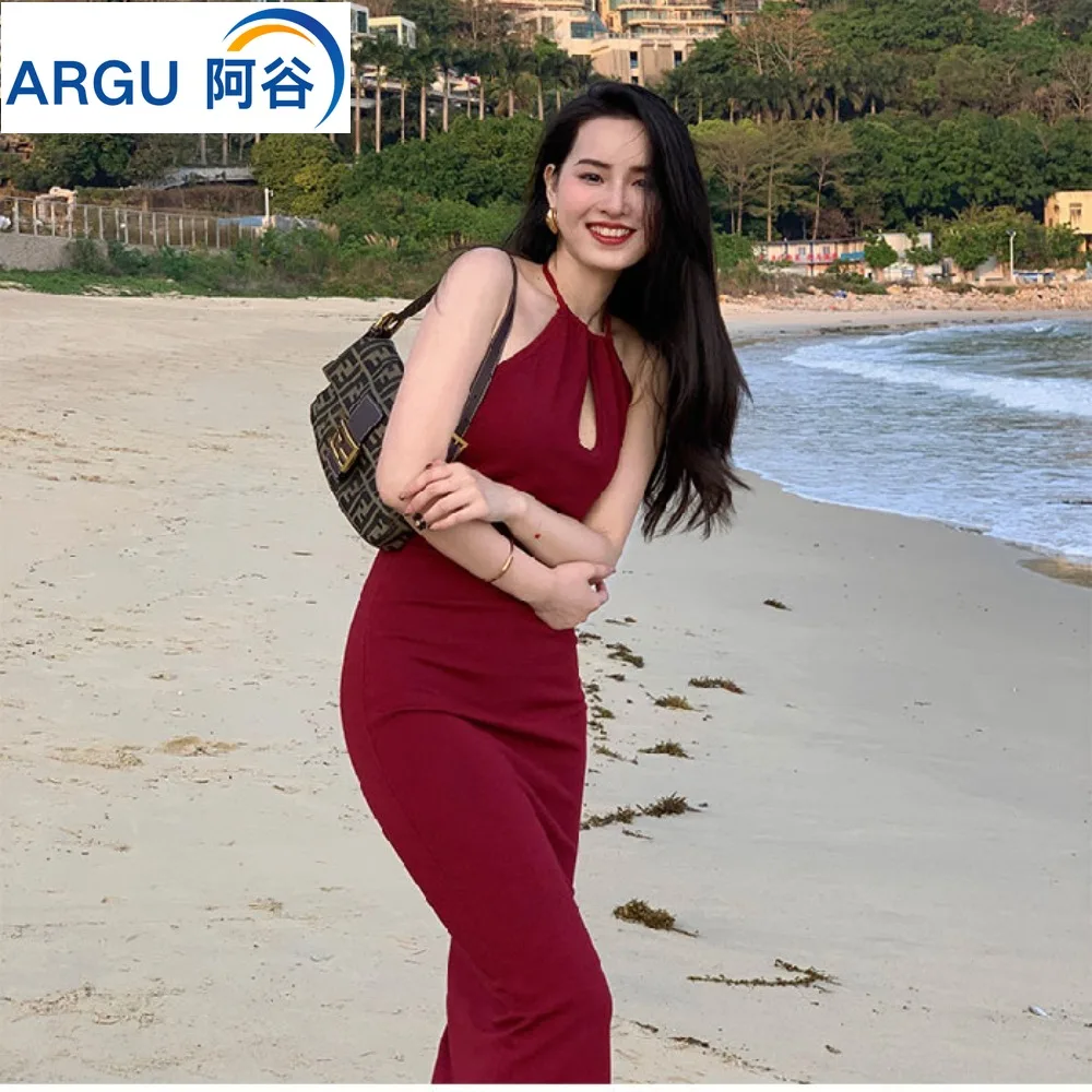

Woman dress summer solid color hollow out hanging neck sexy off shoulder mid length sexy ceremonial robe or dress