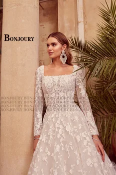 فستان زفاف كلاسيكي من BONJOURY للعروس بياقة مربعة على شكل حرف a وزر مزين بقطار ملكي فيستدوس نوفيس بودا مخصص 3