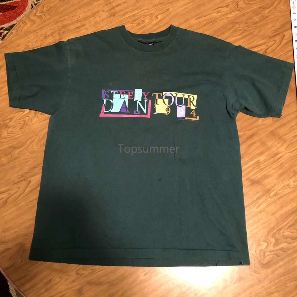 

Steely Dan Xl 1994 Tour Shirt 22.5" W X 28" L Vintage Small Stain Pictured Green