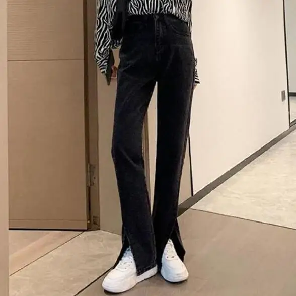 

Женские джинсы, черные брюки-клеш с разрезом спереди, модные весенние брюки-клеш с раздвоенным узором