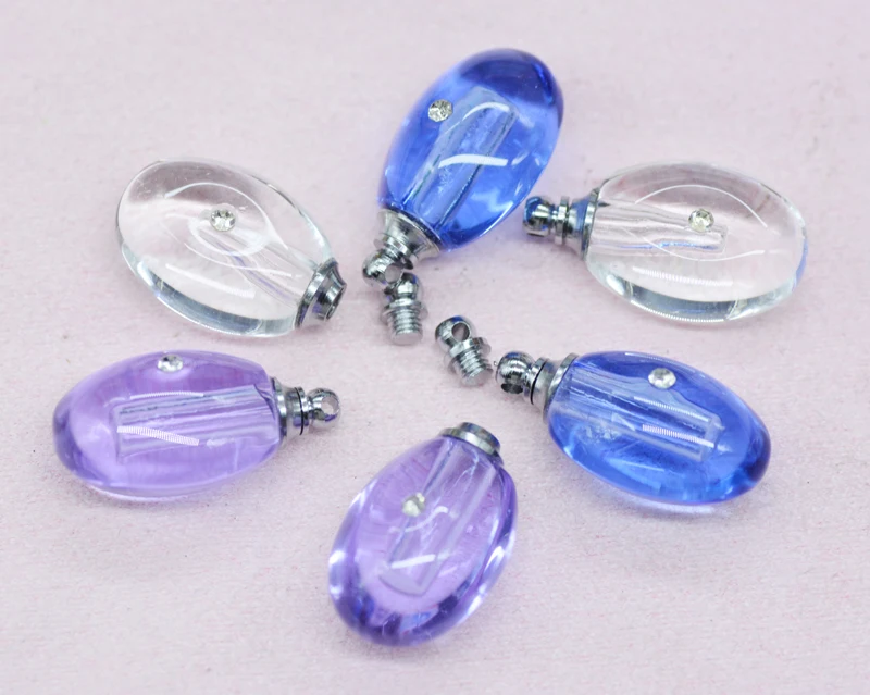 

100pcs/lot of water droplets. Oval, crystal perfume bottle. Wishing bottle necklace pendant. color sent randomly