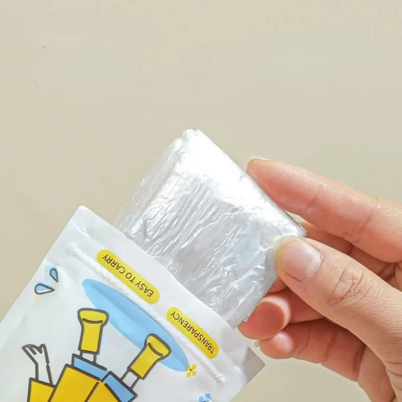1pcs Disposable Cartoon Card Raincoat for Adults and Children Portable Pocket Raincoat for Outdoor Travel