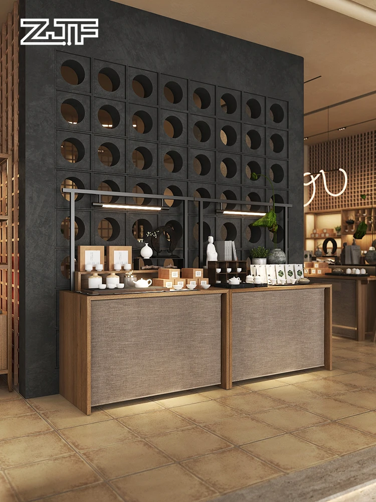 

The tea shop is located near the wall, with a display platform on the island.