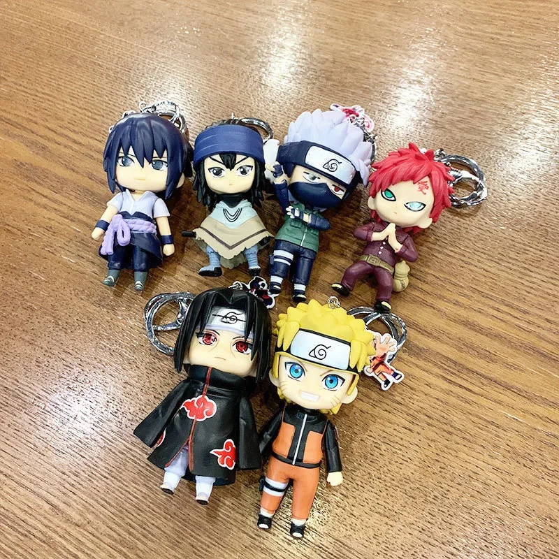 

Naruto Dolls Keychains Cartoon Toys Pendant Uzumaki Uchiha Kakashi Sasuke Garage Kits Toys Decoration PVC Car Key Children Gifts