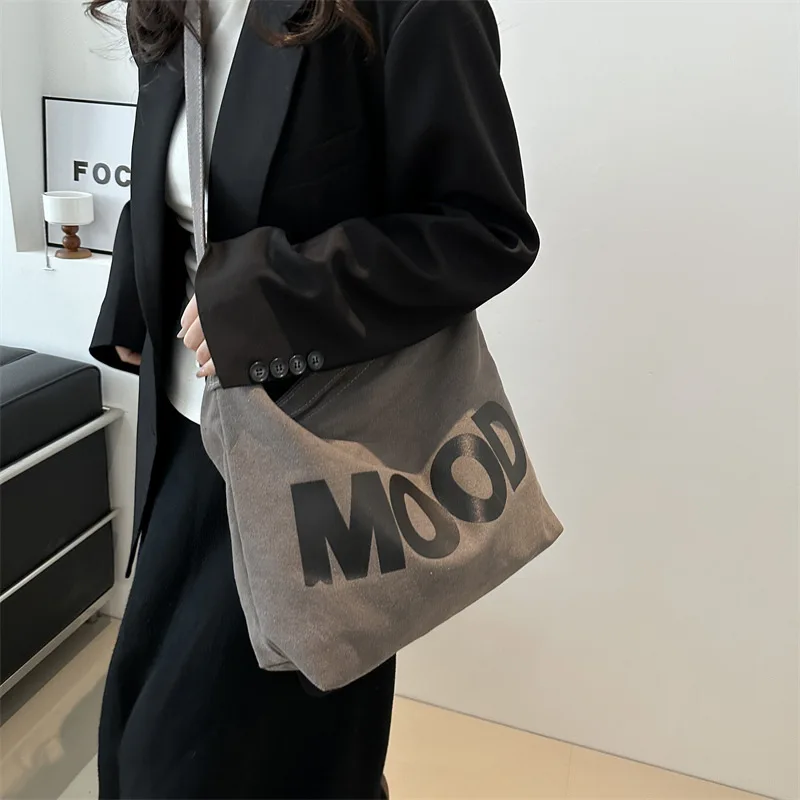 

2024 New Korean Version of The Versatile Large-capacity Shoulder Bag Crossbody Bag Student Campus Canvas Shoulder Bag Tide