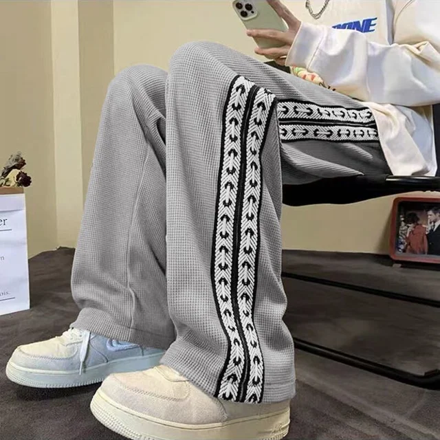 Pantalones informales con estampado de retales para hombre, pantalón holgado de pierna ancha, liso, con bolsillos, estilo americano, a la moda, para otoño