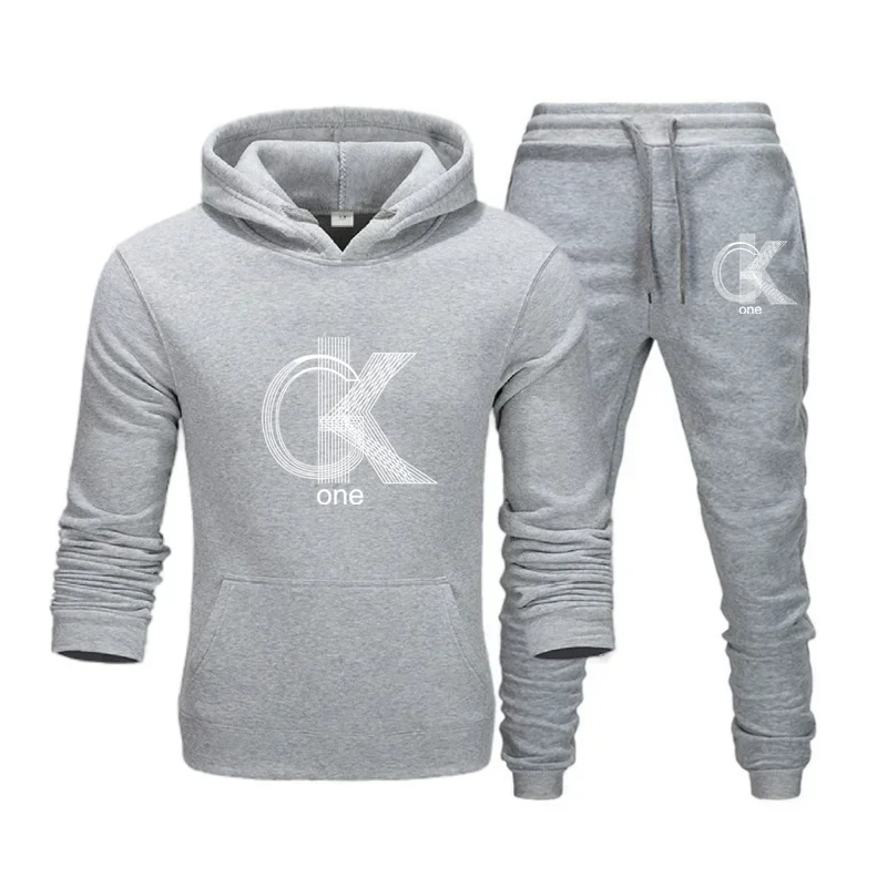 thumbnail image 1 of CK-Conjunto de sudaderas con capucha y pantalones con estampado de tendencia para hombre y mujer, chándales informales, conjunto de ropa deportiva, simplicidad relajada informal, talla grande, 1 of 5