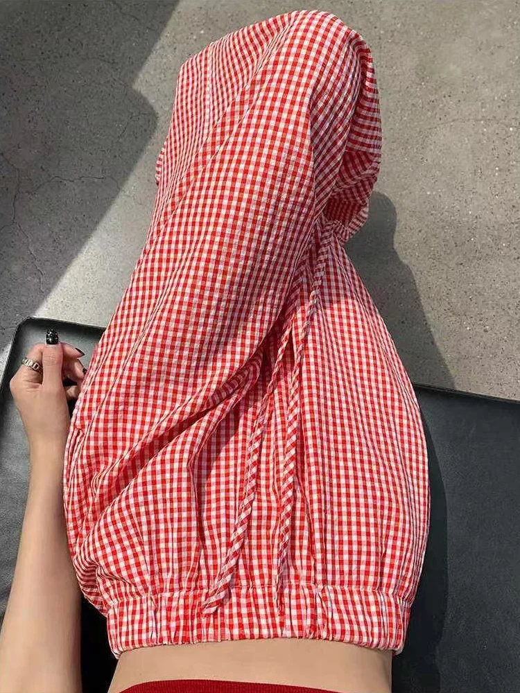 Рисунок 4 - Брюки женские в клетку с широкими штанинами