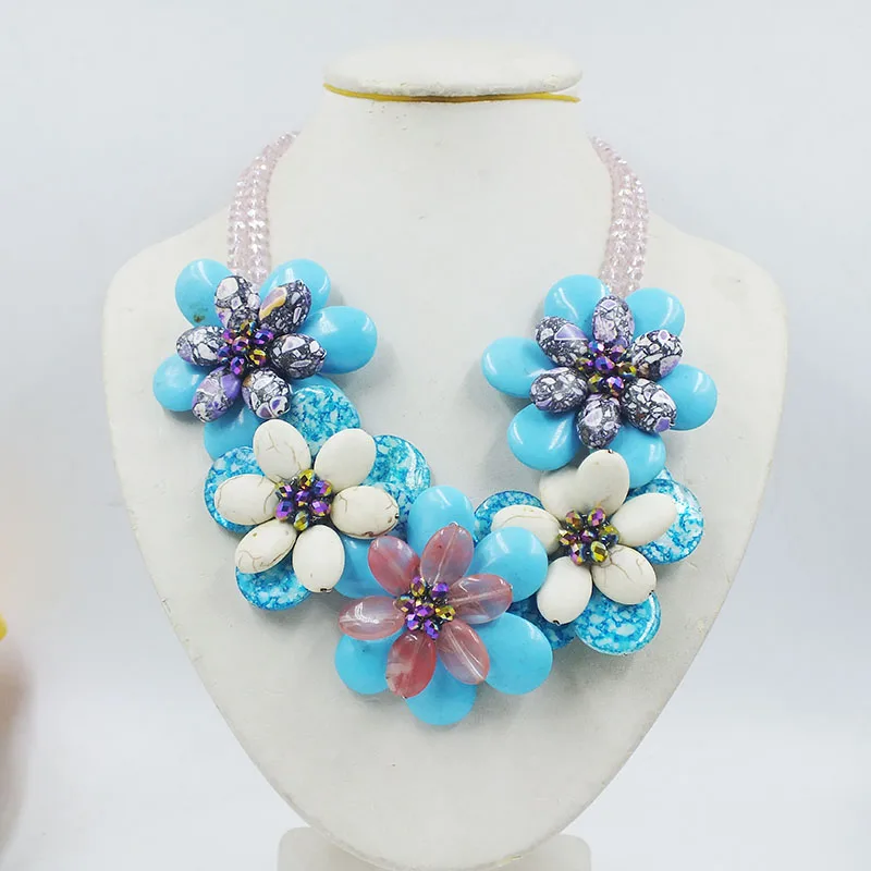 

Natural semi-precious stone/shell/crystal. Hand-woven flower necklace.