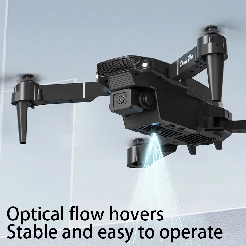 Vue rapprochée du drone E88 Air Professionnel avec Caméra 4K HD WiFi, montrant ses hélices et son design pliable.