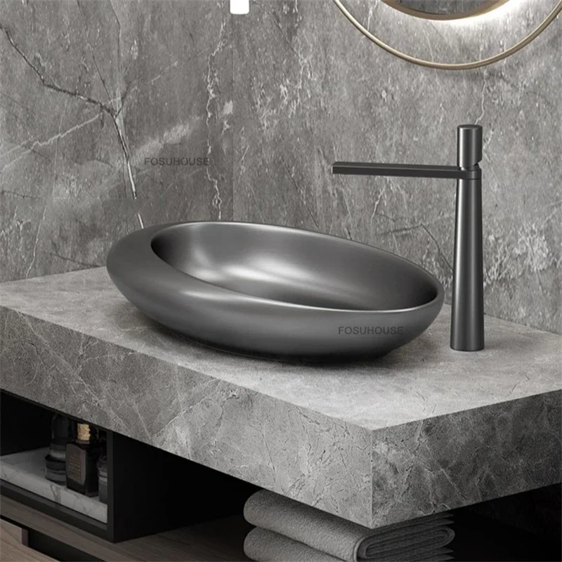 อ่างล้างหน้าแบบตั้งบนเคาน์เตอร์ดีไซน์ทันสมัยสำหรับห้องน้ำ อ่างล้างหน้าแบบตั้งบนเคาน์เตอร์สไตล์ยุโรป อ่างล้างหน้าเซรามิกหรูหราสำหรับห้องน้ำ 1