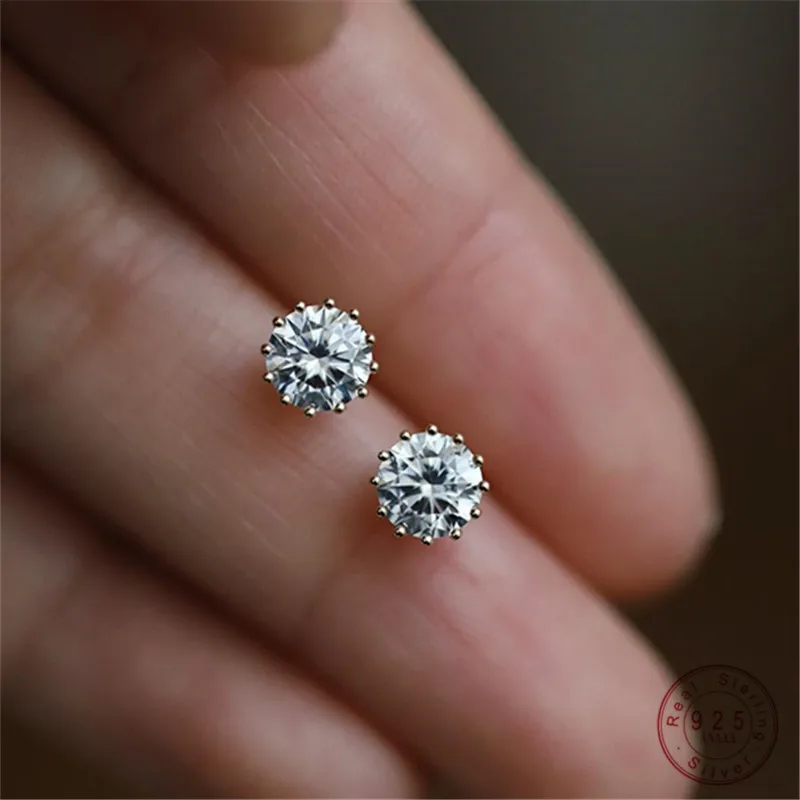 Sterling silver earrings with single Zircon diamond