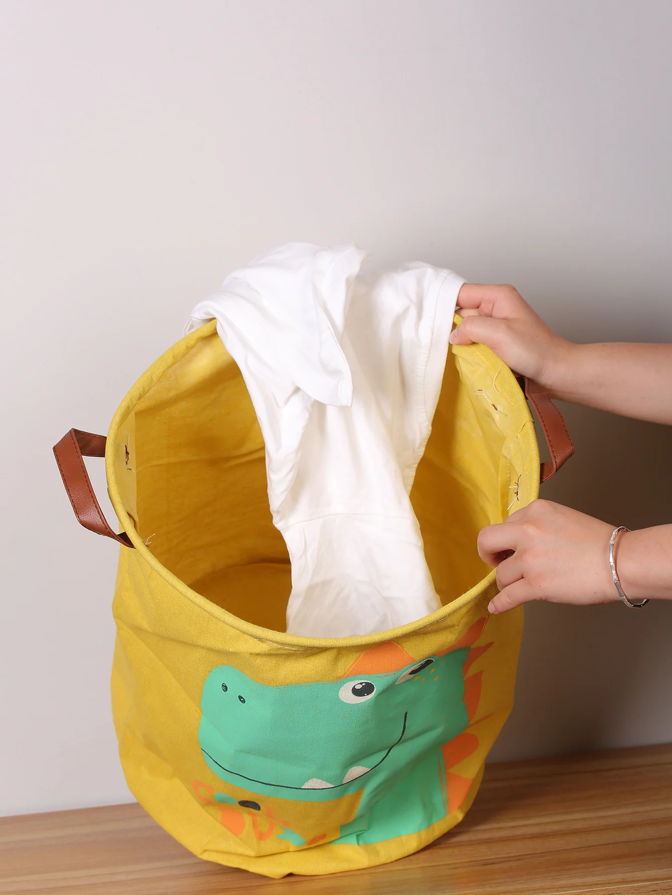 A foldable laundry basket for baby dinosaurs laundry basket clothes basket