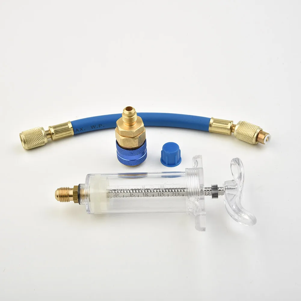 

Oil/Dye Injector 30Ml 1 Oz With Low Side Quick Coupler Adapter 1/4 SAE X4T7 Coolant Filler Pipe Injection Tools