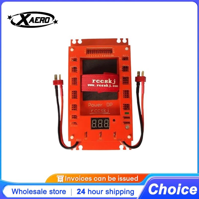 Module d'alimentation double batterie 12 canaux pour drone FPV avec interrupteur électronique et CDI intégré, montrant les connecteurs et le boîtier robuste.