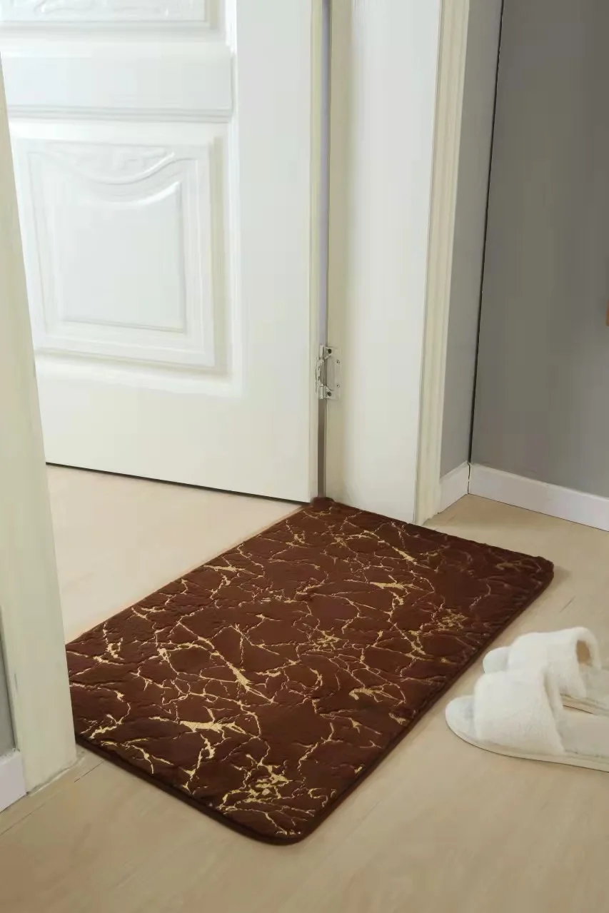 Soft faux rabbit bath mat in beige, rectangular, non-slip for bathroom or living room.