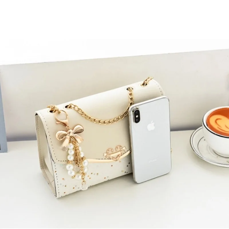 Crossbody women's bag with pendant chain Korean version ins fashion and versatile premium shoulder bag