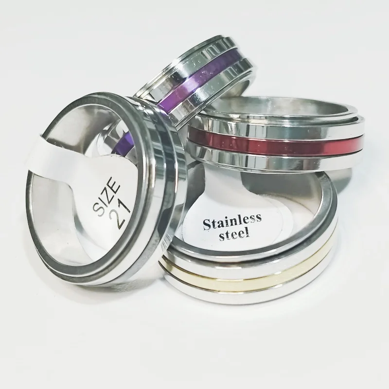 

Wholesale 36 pcs 8mm Flat four color mixed rotating Stainless Steel Ring