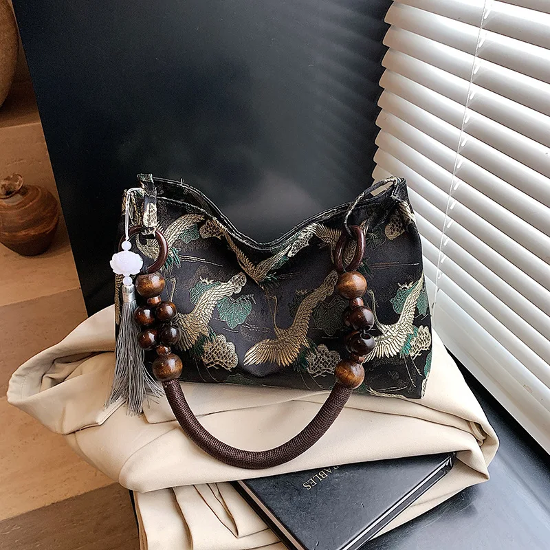 Borse a Spalla con Nappe Decorative Ricamate Stile Etnico Chiusura a Cerniera Filo da Cucito Nuova Collezione Primavera 2026 Borse da Donna di Tendenza