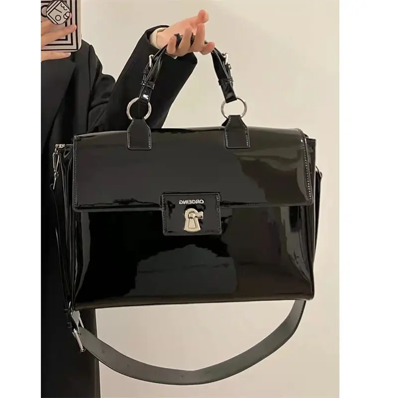 thumbnail image 1 of Bolso de mano de lujo para mujer, de piel sintética suave lacada, de gran capacidad, portátil, informal, versátil, tipo mensajero para estudiantes, 1 of 4