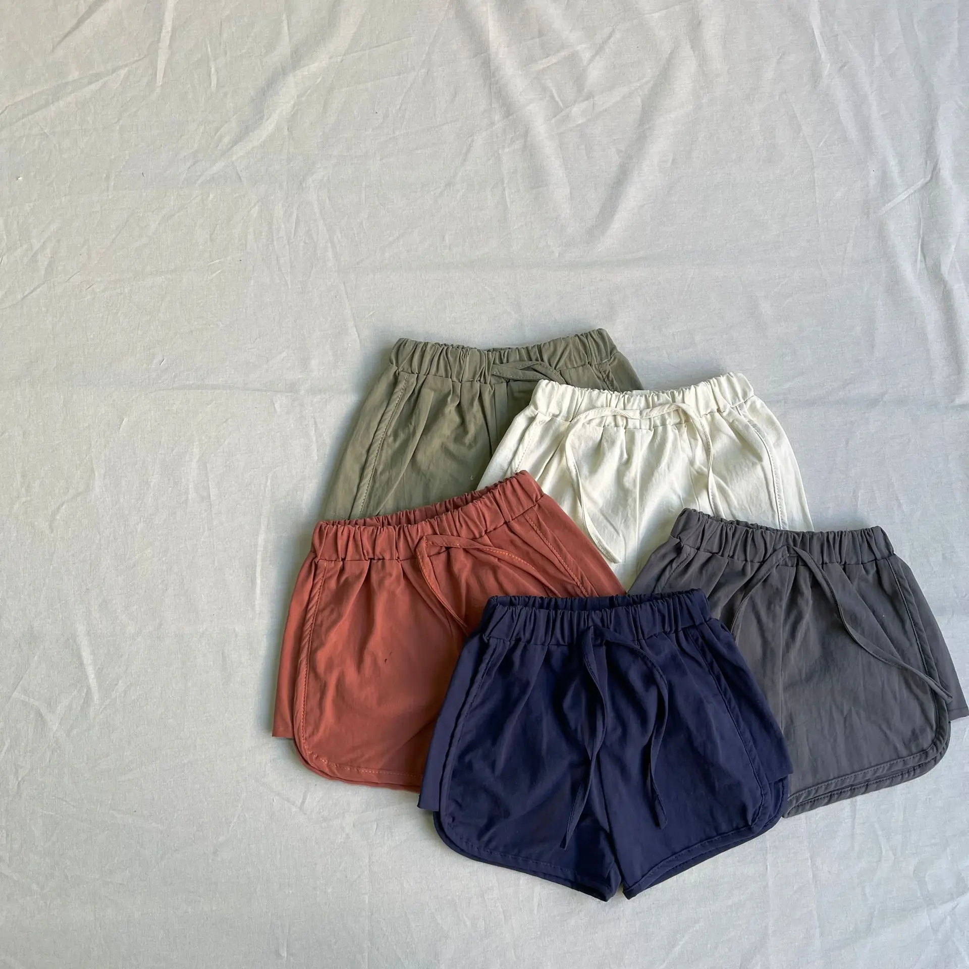 2025 Summer New Baby Casual Shorts Solid Infant Loose Fashion Shorts Cotton Boy Girl Breathable Beach Pants Toddler Clothes