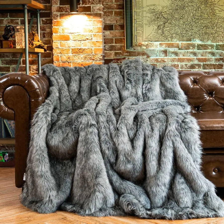 Extra large faux fur blanket perfect for couch or bed super soft and fluffy with elegant grey color featuring black tips revers