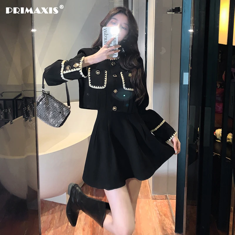 Рисунок 5 - Костюм-двойка с юбкой на пуговицах и длинным рукавом