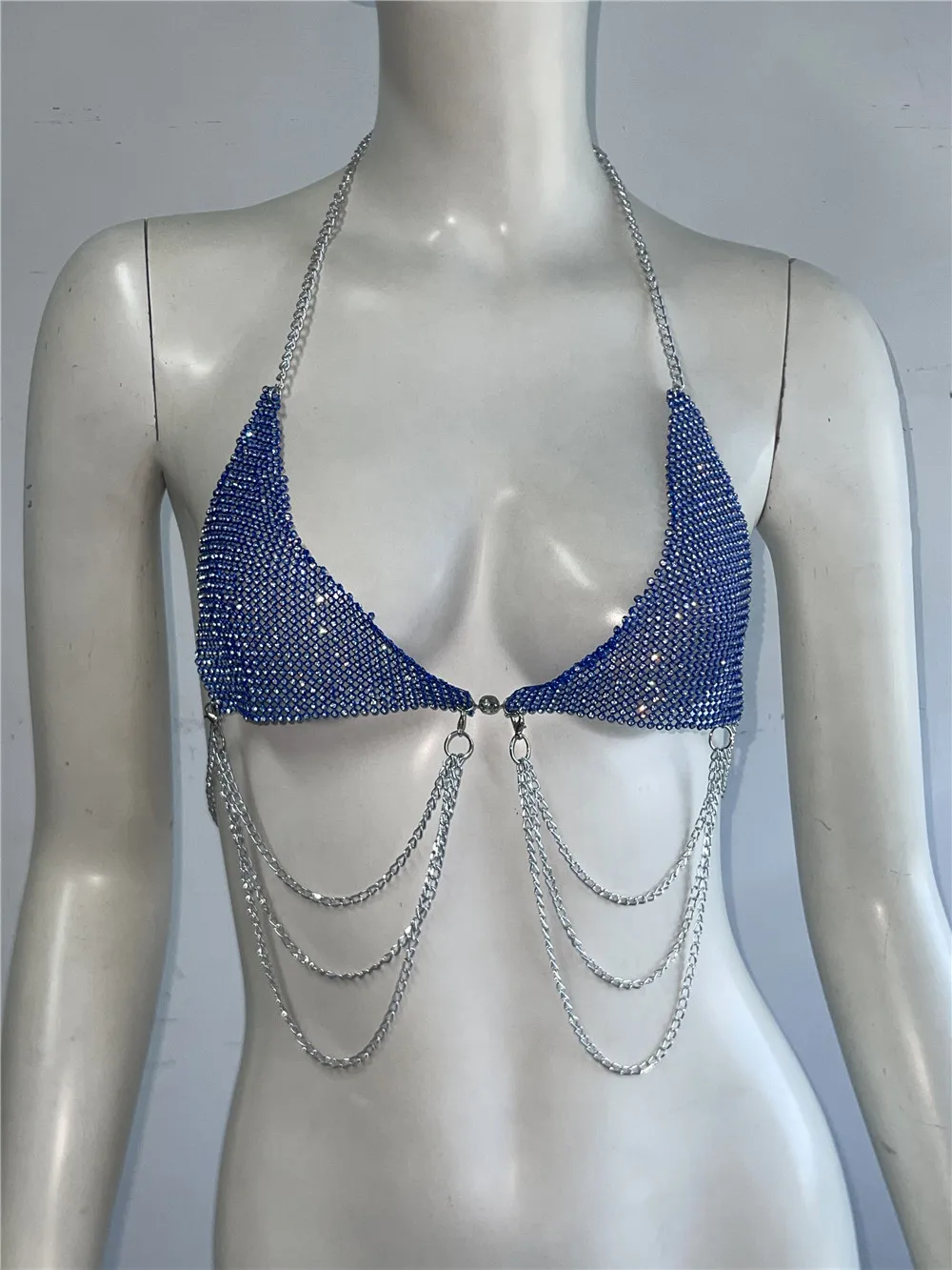 Nightclub outfit top paired with denim for edgy streetwear fashion