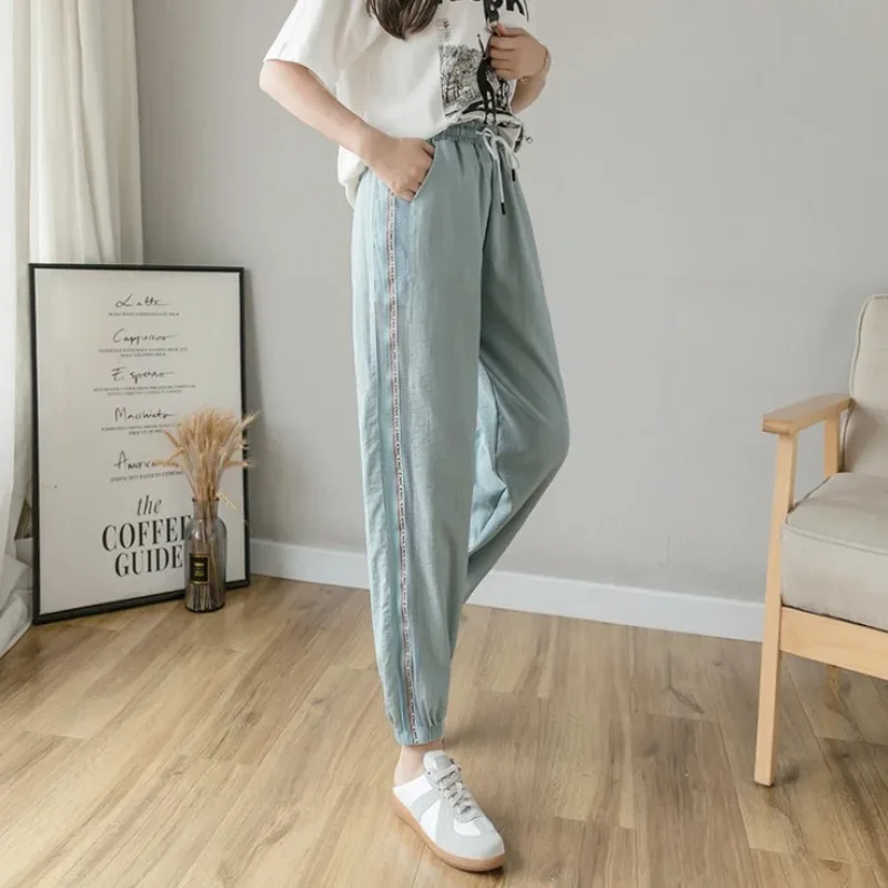 Women's Spring Autumn Striped Letter Drawstring Printed Pockets with Elastic High Waisted Casual Harlan Sports Trousers Pants 2023 slightly chubby wear with oversized distressed cropped jeans children s harlan dad pants high waist summer thin style