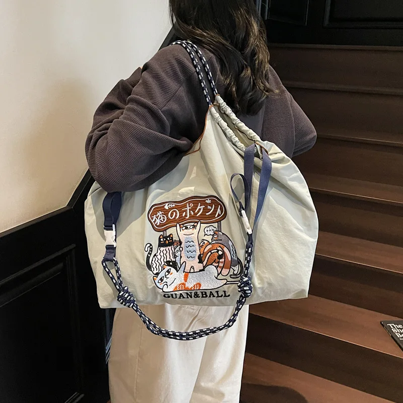 Eco-Friendly Embroidered Nylon Tote: Stylish and Spacious City Handbag