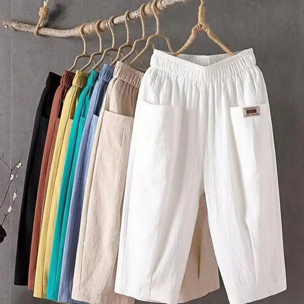 

Women Summer Cropped Pants Mid-rise Elastic Waistband Wide Leg Casual Pants Solid Color Pockets Design Harem Trousers