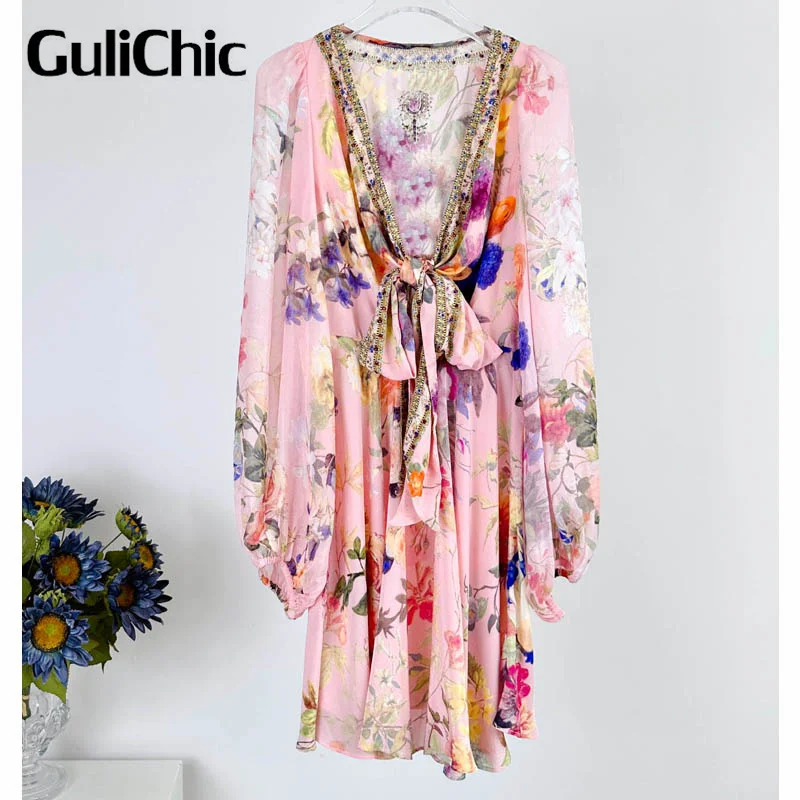 

1.18 GuliChic Women Beach Resort Style Flower Print V-Neck Diamonds Decoration Lace-Up Hollow Out Sexy Mini Silk Dress