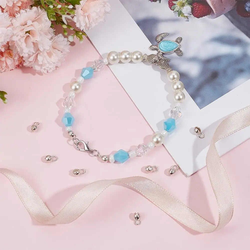 10 Stück 18 Karat vergoldete Messing-Lederband-Quetschperlen mit Schlaufe, Muschelperlen, Enden für 1,5 mm Kette, Halskette, Schmuckherstellung – Detail 7