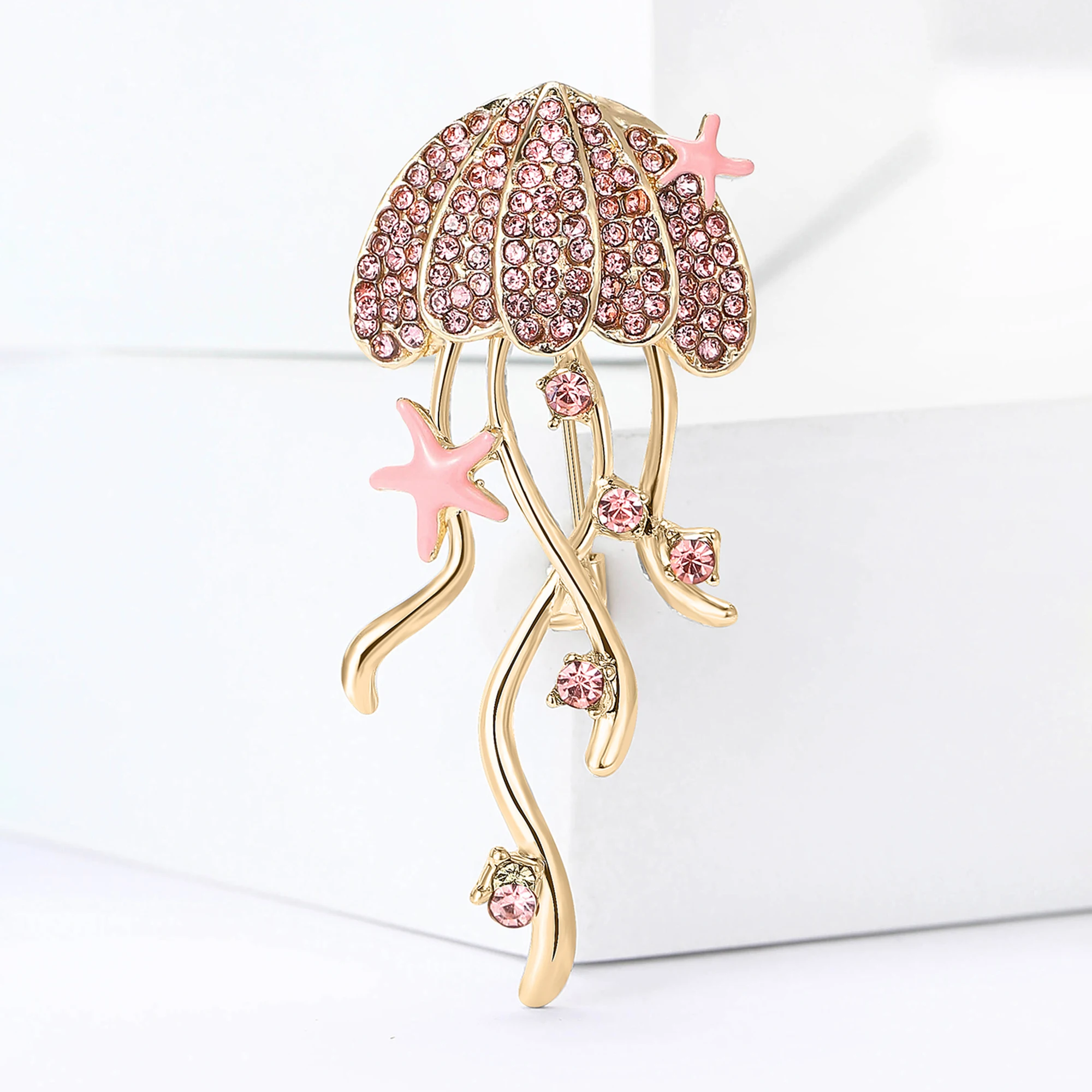 دبابيس جميلة على شكل قنديل البحر من حجر الراين للن...