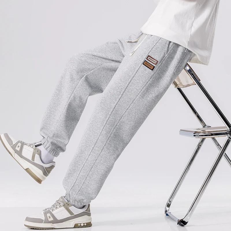 Spring Autumn New Solid Color Fashion Elastic Waist Sweatpants Man High Street Casual Loose Pockets Drawstring Cotton Trousers