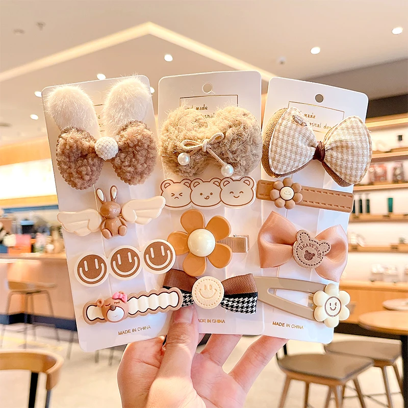 https://ae01.alicdn.com/kf/Sec243908d3b346e393e1d22556f87c2fQ/4-8-Pcs-Set-Children-Cute-Coffee-Color-Plush-Cartoon-Flower-Bow-Ornament-Hair-Clips-Girls.jpg