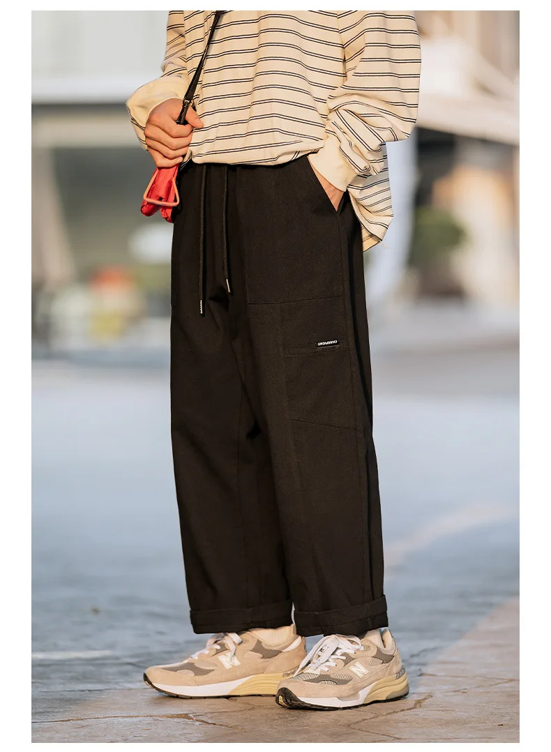 Work casual pants straight tube splicing patch pocket design feeling long cargo pants men baggy pants