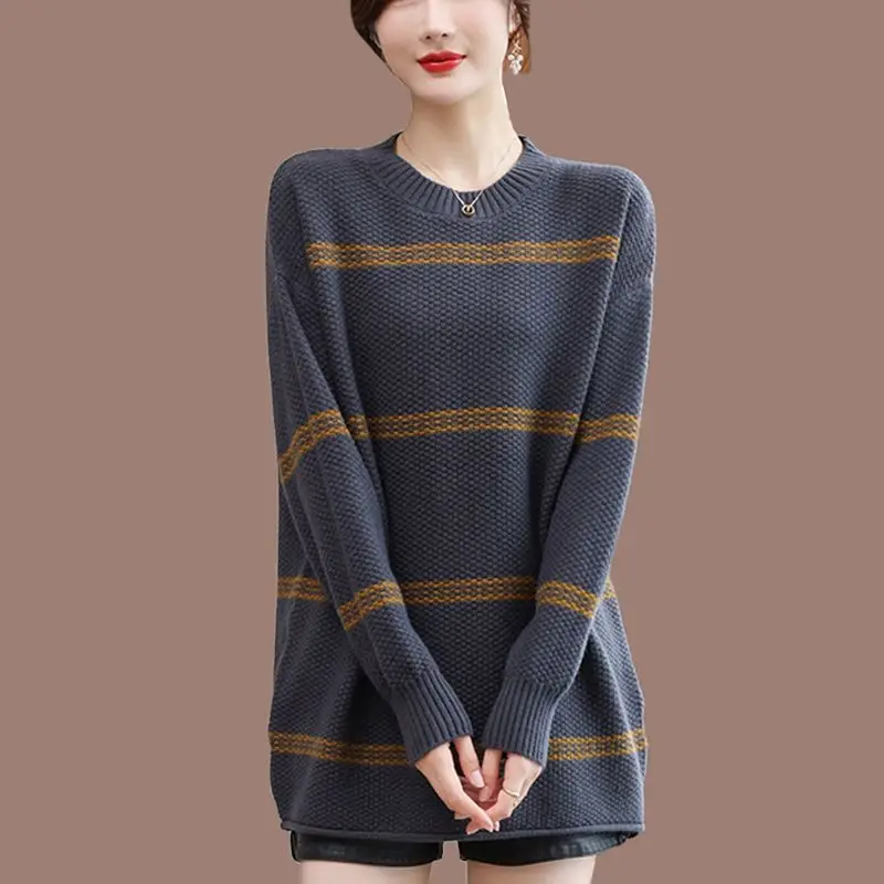 

2023 Autumn and Winter Minimalist Round Neck Striped Color Matching Long Sleeved Casual Loose Oversized Pullover Knit Sweater