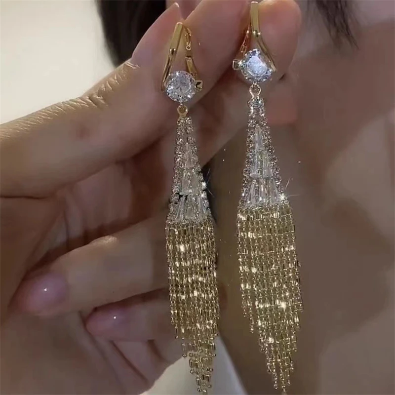 2315969-b5bb52.jpg Sec6cc3eb5ca04f5982a3c5810fedf99fq Luxury Zircon Long Tassel Golden Earrings for Women Exquisite Flower Leaf Water Drop Earring Wedding Party Valentine's Day Gifts Mallzona
