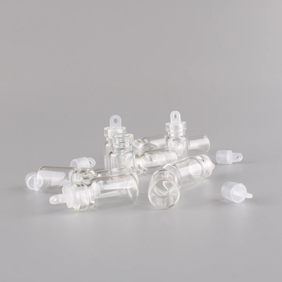 100pcs 11*22*6.5mm 1ml Mini Glass Wishing Bottles Tiny Jars Vials With Plastic Stopper 4