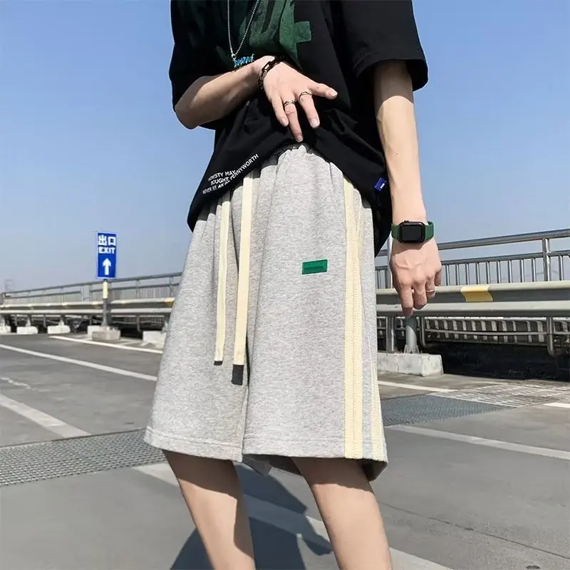 Fashion High Street Men New Summer Motion Youth Patchwork Striped Casual Loose Straight Cylinder Comfortable All-match Shorts