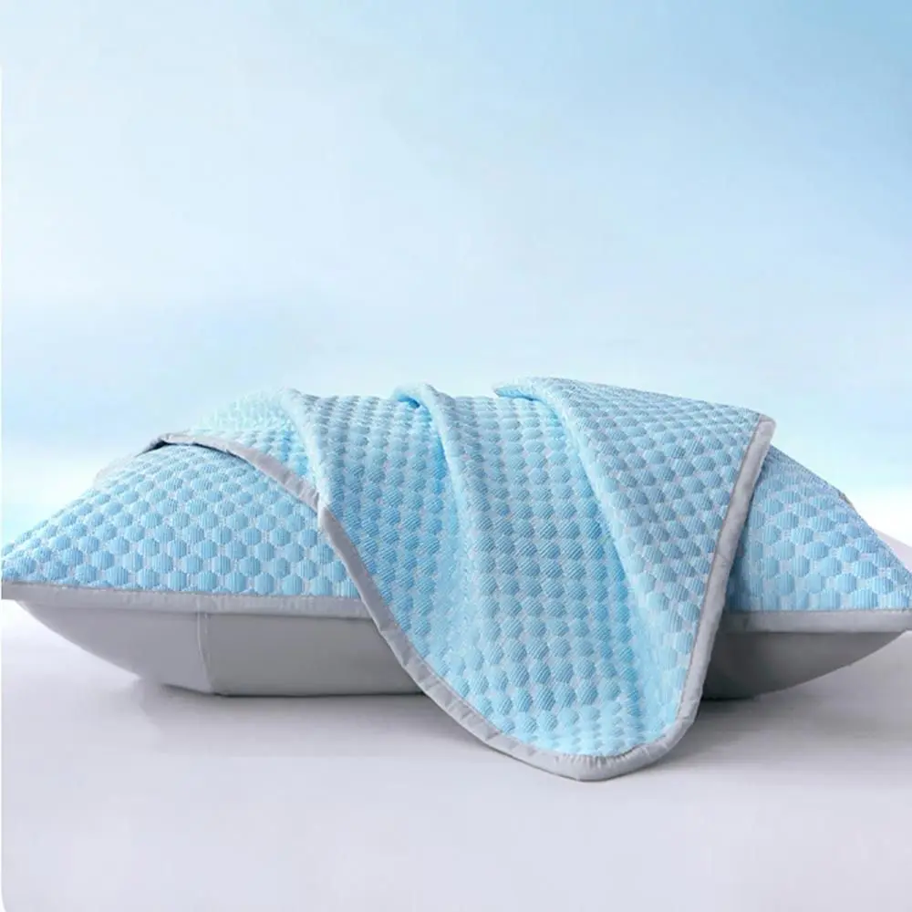 Blue textured pillow cover showing its surface and reverse