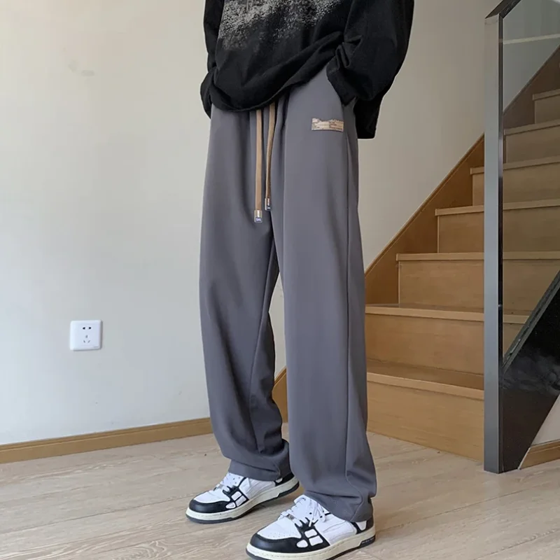 

2023 Autumn and Winter New Trend Men's Clothing Fashion Splicing Pockets Drawstring Simple Solid Color Versatile Oversize Pants